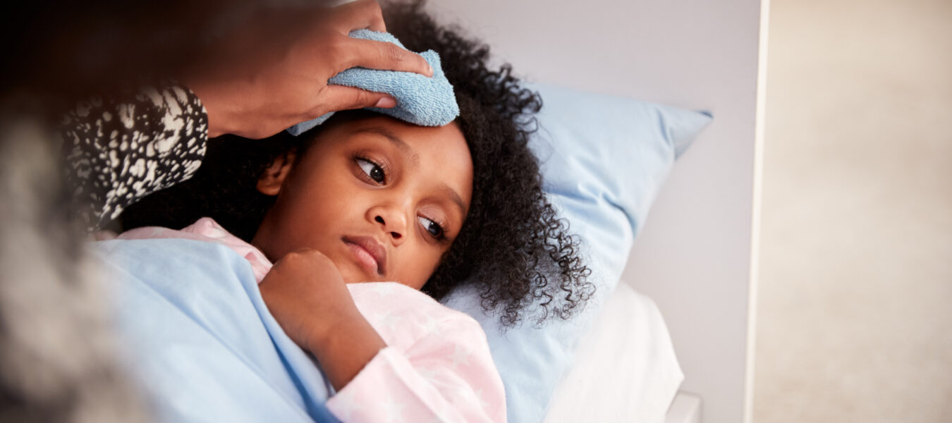 Mother Caring for Sick Daughter