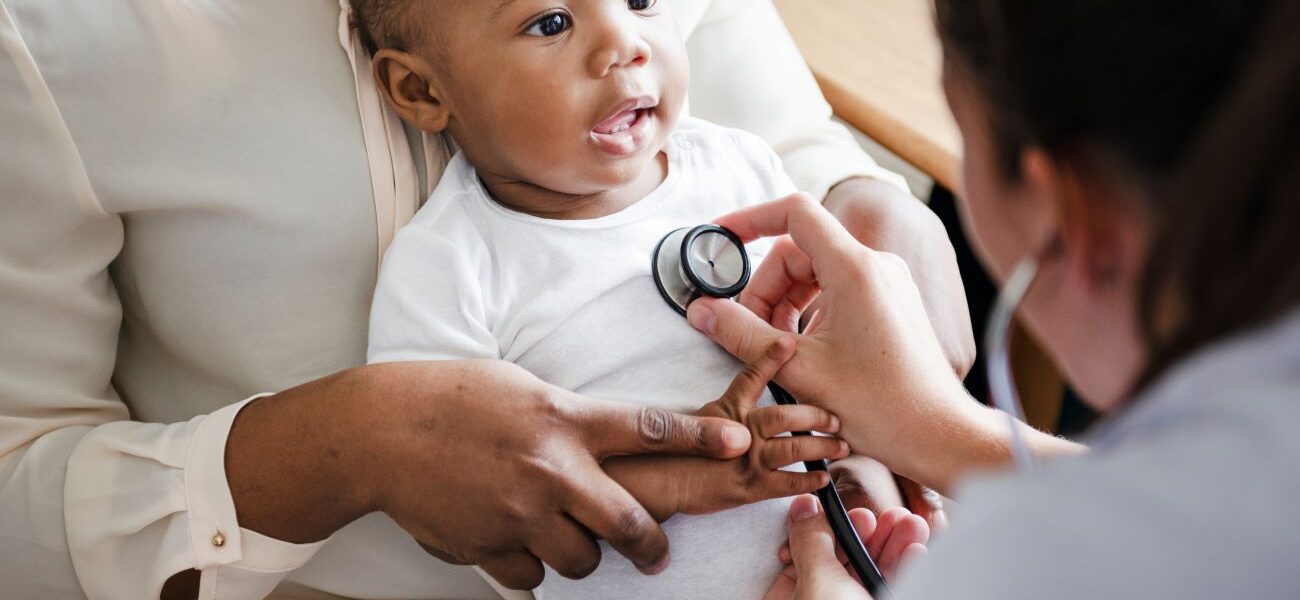 A baby receiving care
