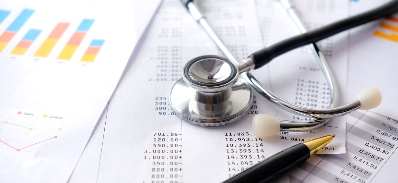 Stethoscope with Pen, Charts and Graphs