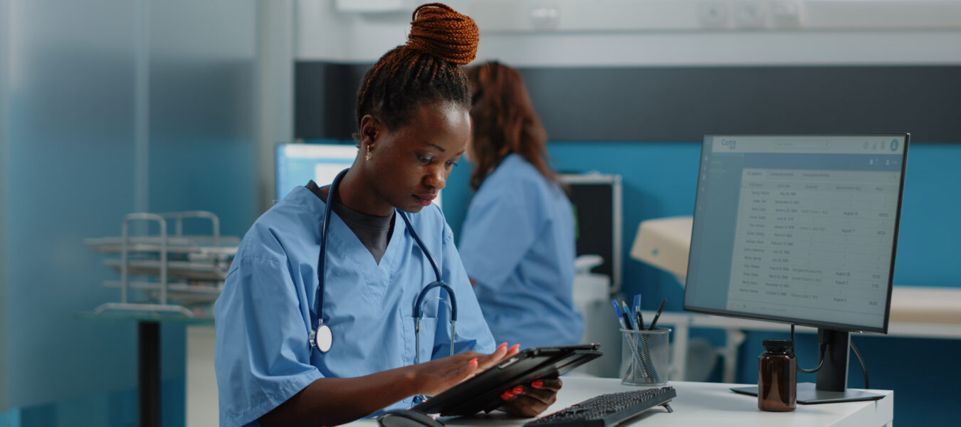 A nurse using a tablet