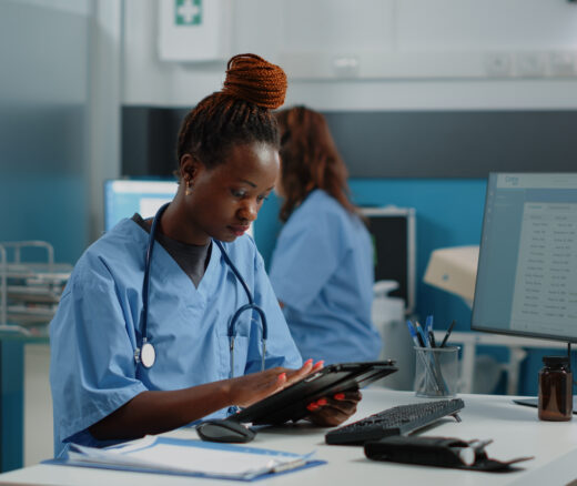 A nurse using a tablet