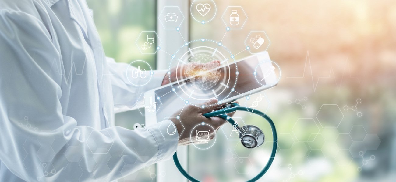 A doctor holding a tablet and a stethoscope with a health-tech graphic in the center.