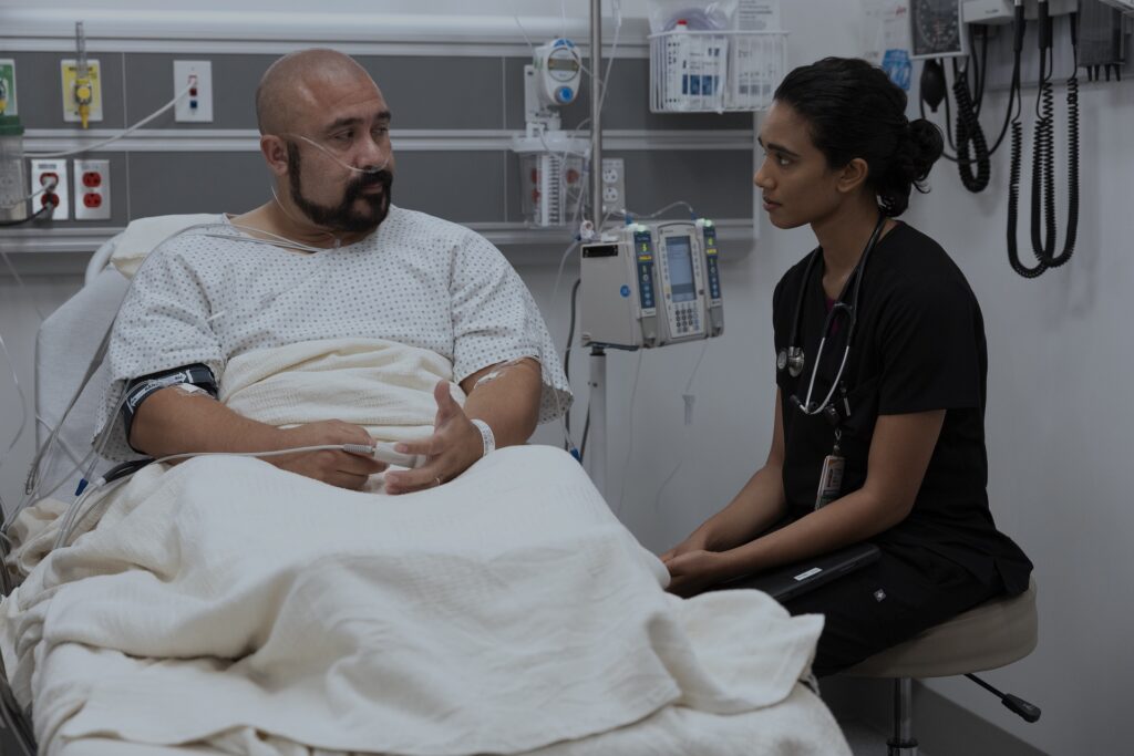 William Guirola, Supriya Ganesh in The Pitt, Season 2. Photograph by Warrick Page. Courtesy of HBO Max.